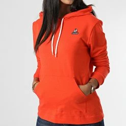 Grosses soldes 🔔 Sweat Capuche Femme 2210800 Orange de Le Coq Sportif 🔥